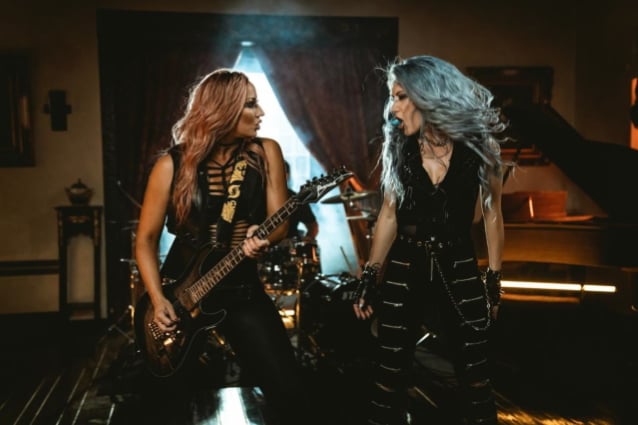 NITA STRAUSS Recruits ARCH ENEMY's ALISSA WHITE-GLUZ For New Single 'The Wolf You Feed' NITA STRAUSS,ARCH ENEMY,ALISSA WHITE-GLUZ,The Wolf You Feed